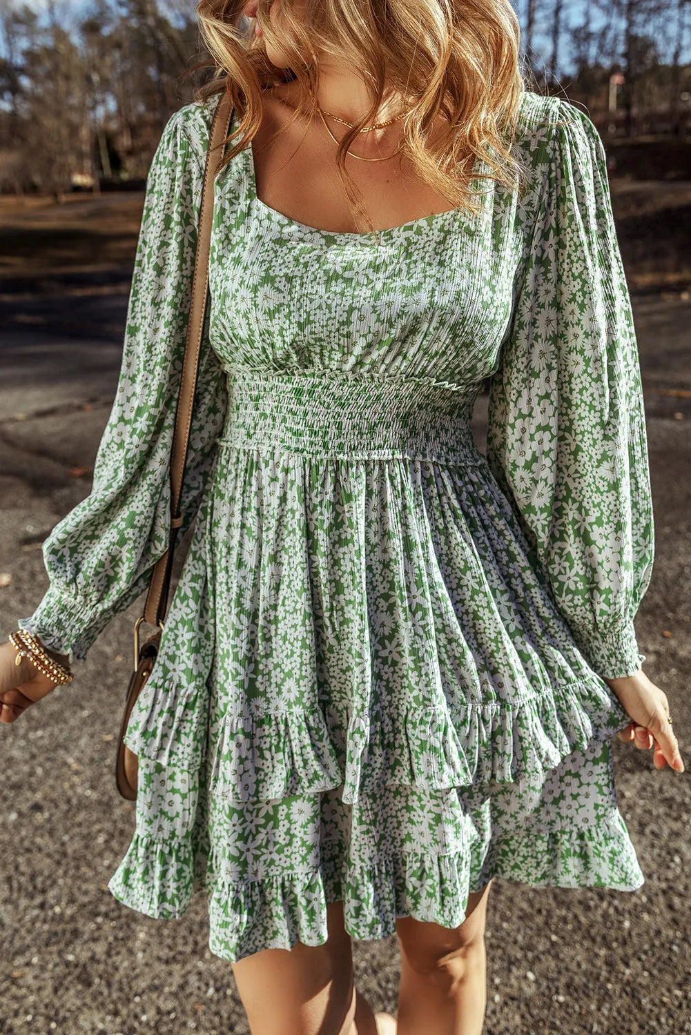Floral print mini dress with square neckline and ruffle hem.