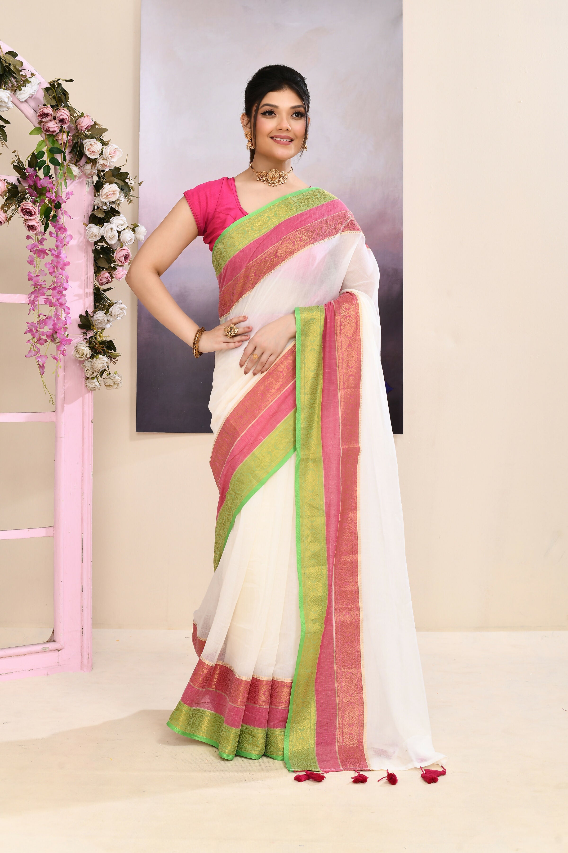 Piyari Fashion off white cotton saree with ornate zari border