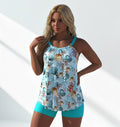 A sporty one-piece swimsuit in a light blue and teal random print, designed for a flattering fit.