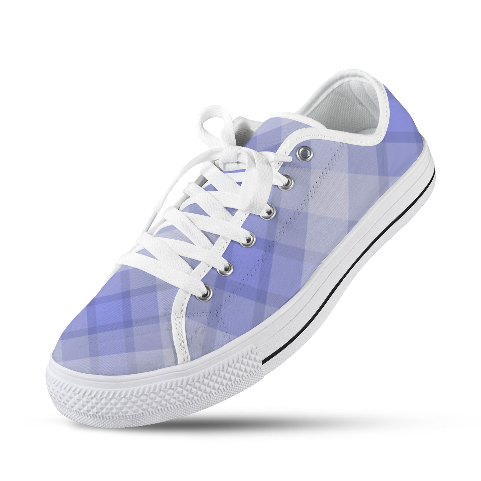 A pair of light blue plaid low top women's canvas sneakers on a white background