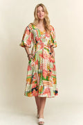 Vibrant floral midi dress with puff sleeves and V-neckline.