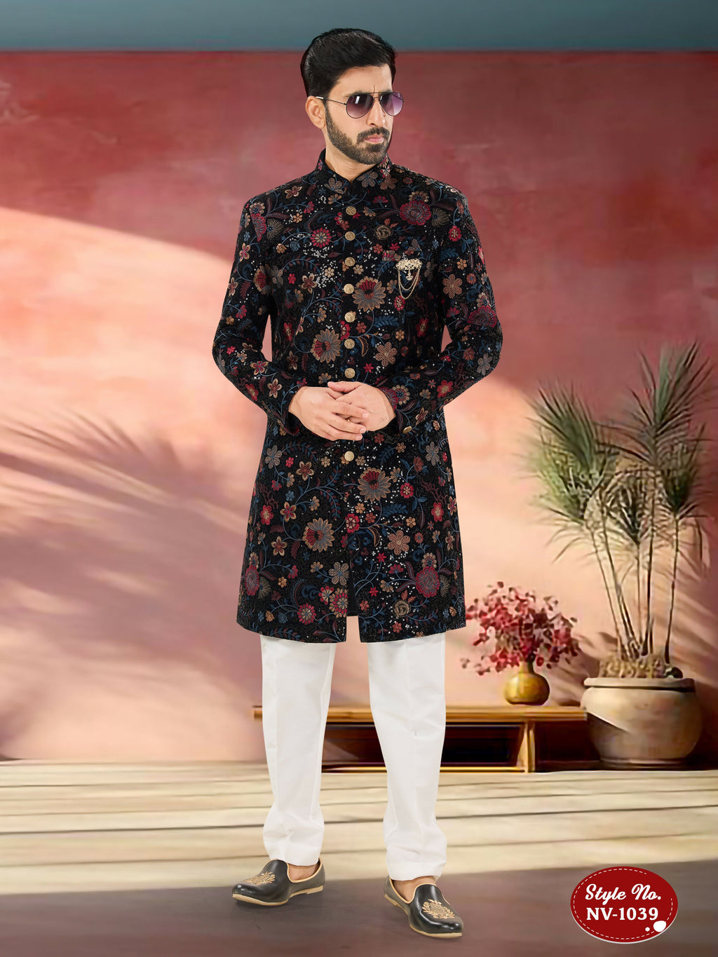 Men's blue velvet Indo-Western kurta set featuring heavy multi-colour embroidery detail