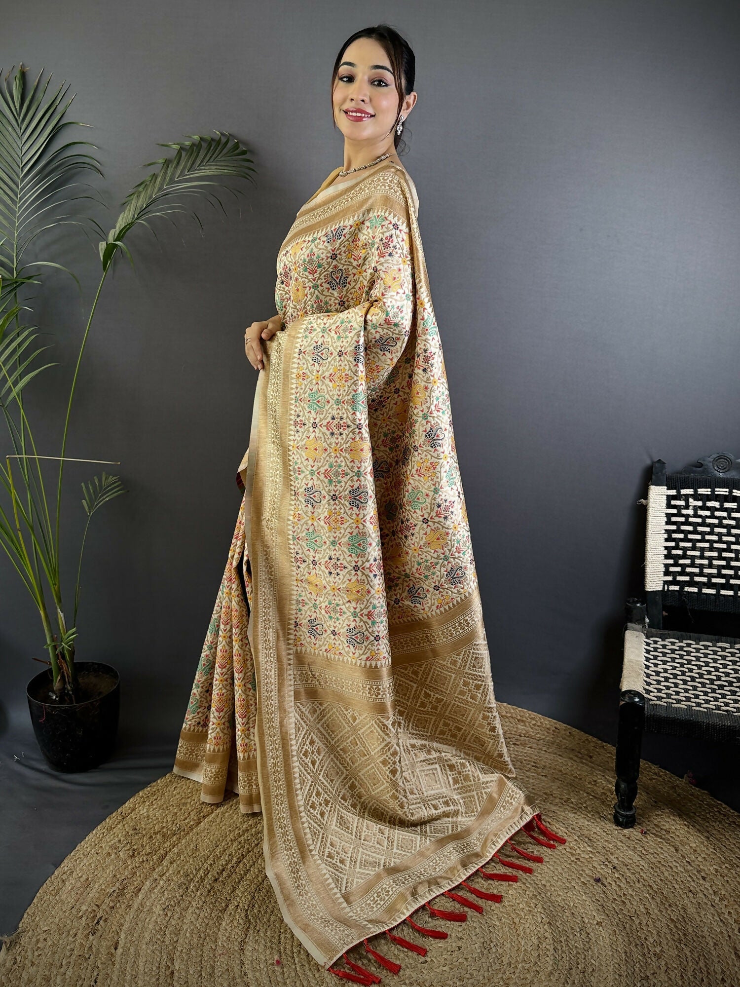 Cream Soft Silk Banarasi Saree with Intricate Floral Woven Motifs