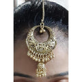 Antique gold plated traditional Chandbali Maang Tikka and hanging Jhumka earrings for Indian ethnic wear.