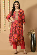 Woman wearing a vibrant red Maslin kurta set with matching cotton bottoms