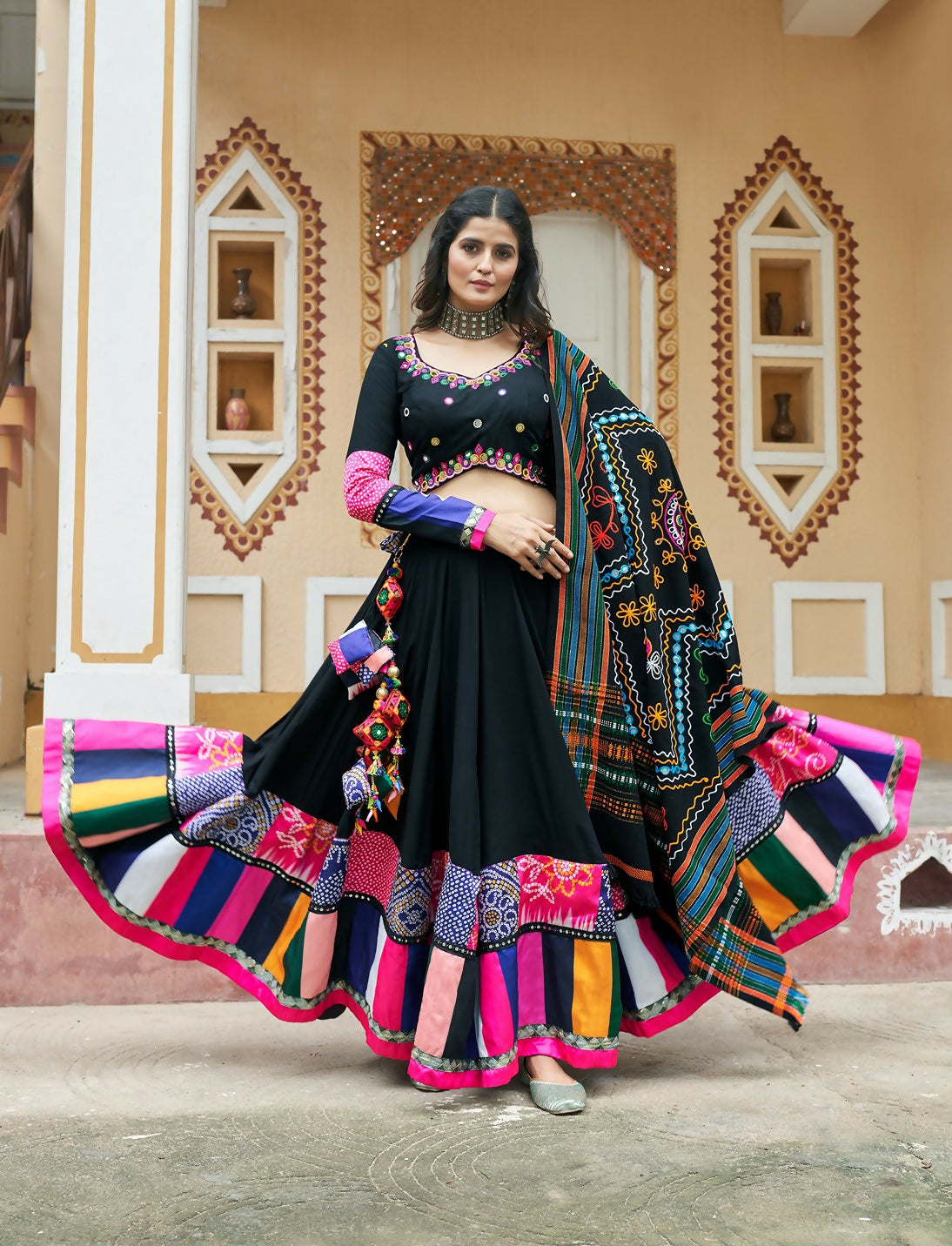 A beautiful black viscose rayon designer lehenga choli set for Navratri festivals.