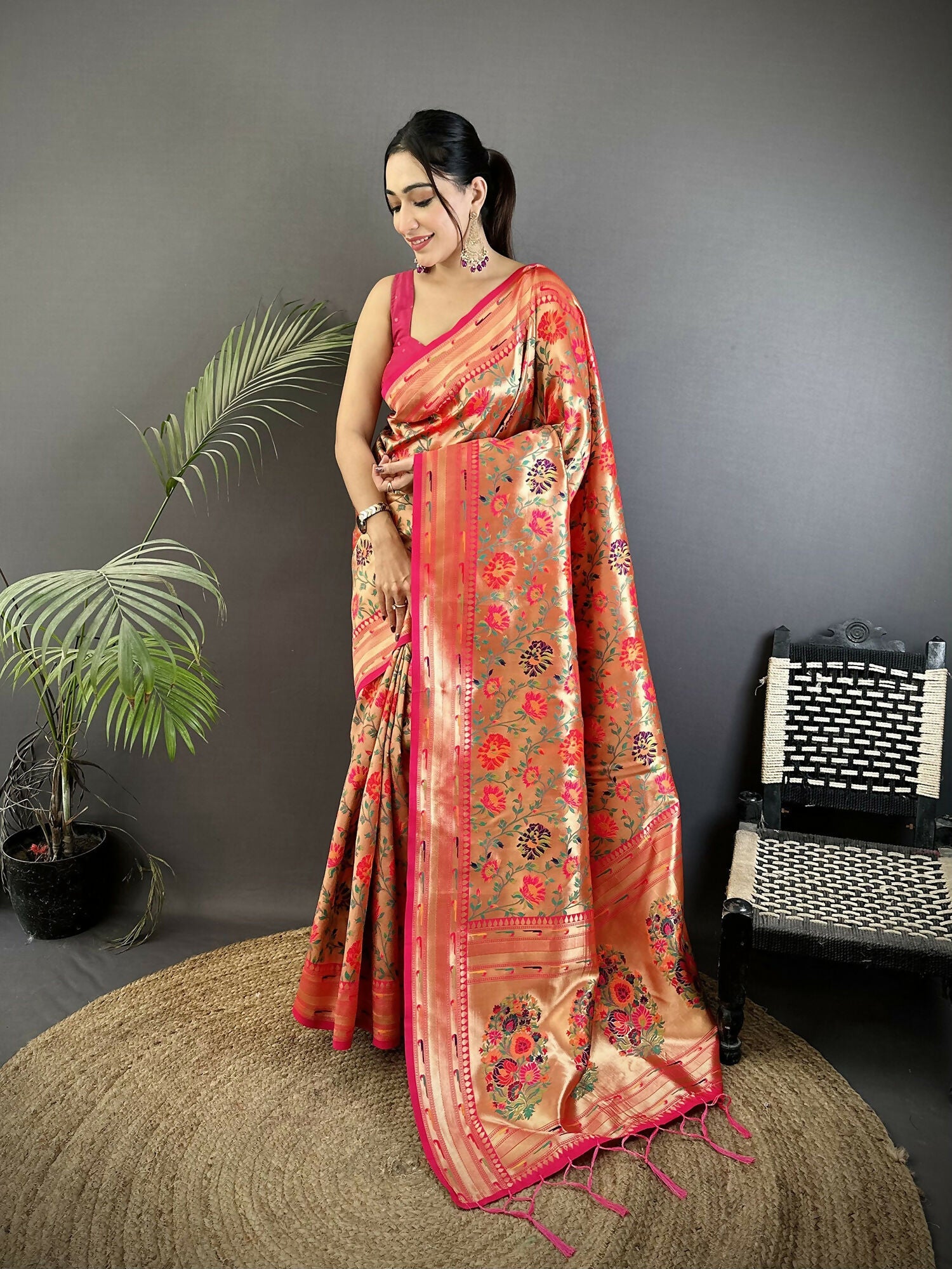 Pink soft silk Paithani saree with floral and paisley motifs