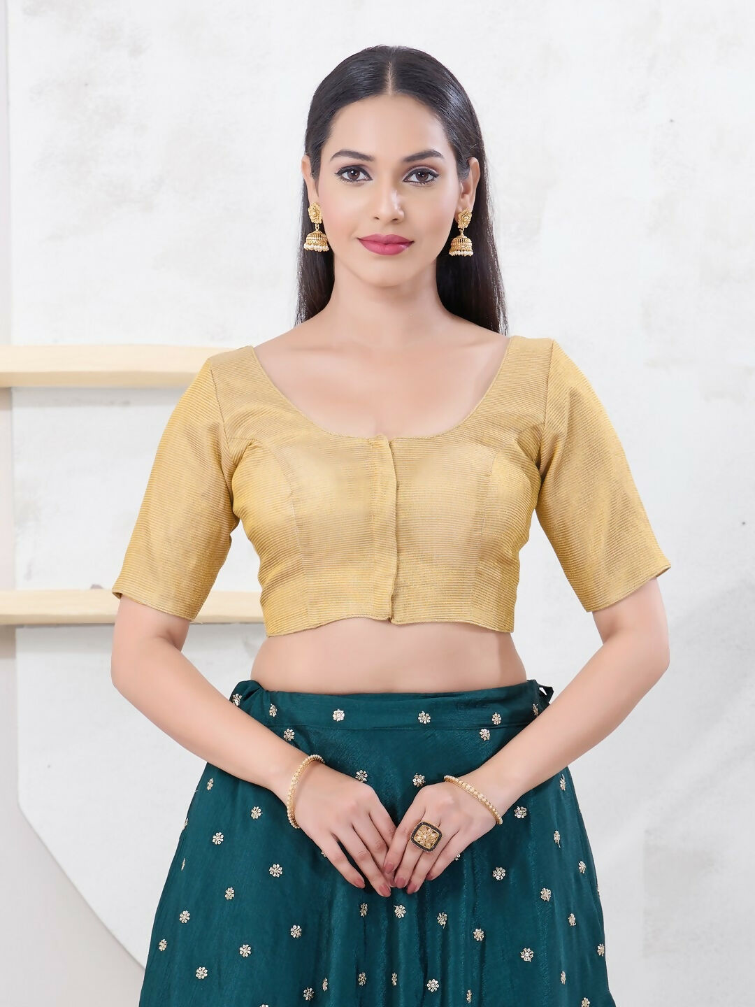 Elegant Gold Tissue fabric blouse with round neck and elbow sleeves