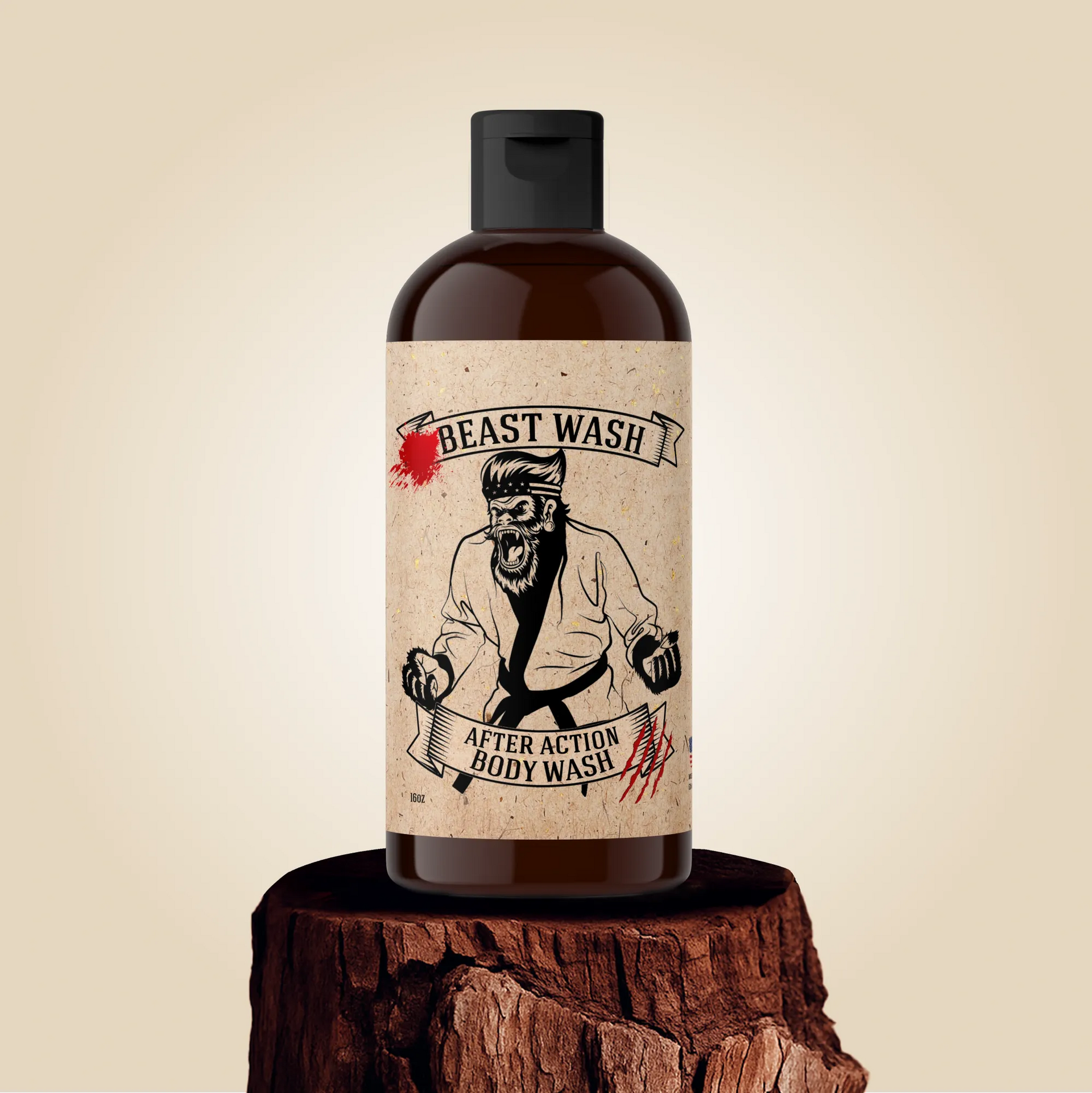A 16oz bottle of Johnny Slicks After Action Body Wash on a tree stump with a label showing a graphic of a beast in a martial arts gi.