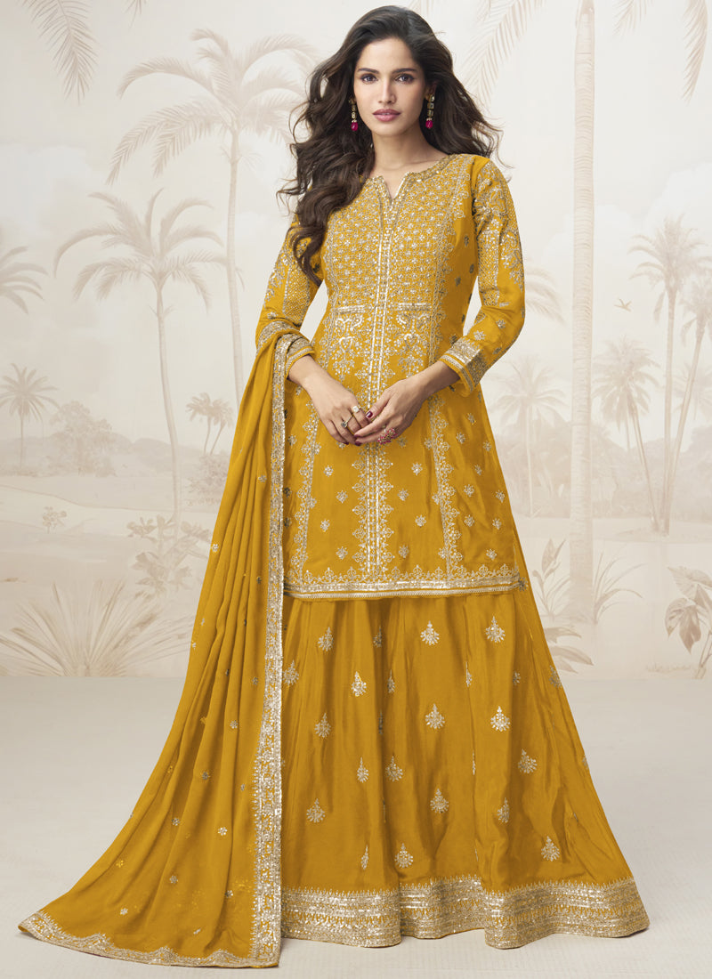 Bright yellow Chinon silk sharara suit with festive gota patti embroidery