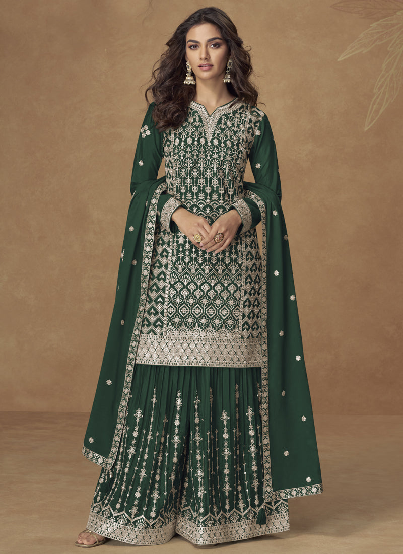 Vibrant green Chinon silk sharara suit with detailed gold embroidery