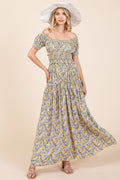 Floral print maxi dress with puff sleeves and gathered detailing