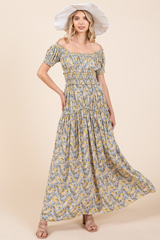 Floral print maxi dress with puff sleeves and gathered detailing