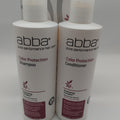 ABBA Color Protection Duo shampoo and conditioner bottles in minimalist white and maroon packaging