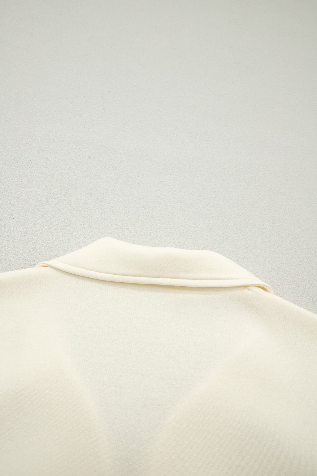 Juniper Ruffled Short Sleeve Blouse in Off-White and Cream