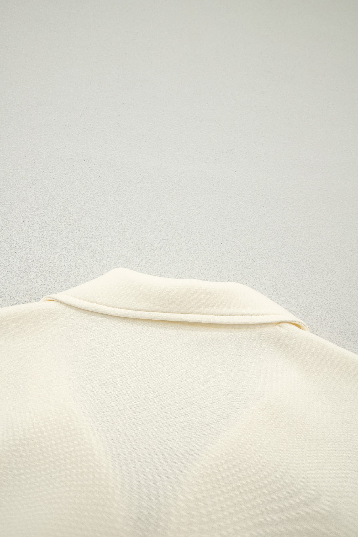 Juniper Ruffled Short Sleeve Blouse in Off-White and Cream