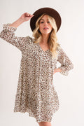 Bohemian style leopard print woven mini dress with ruffle hem
