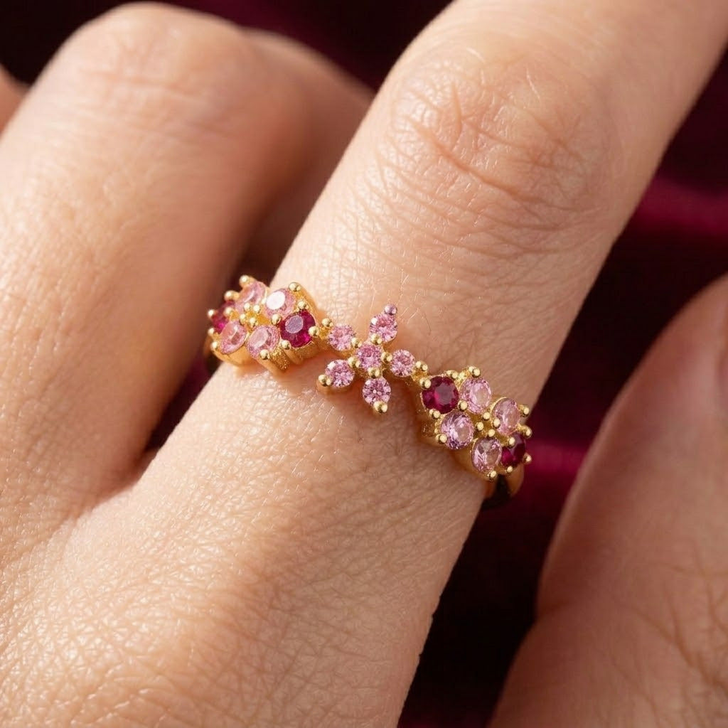 Elegant gold-plated open-ring featuring a delicate flower design with pink zircon accents.