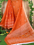 Bright orange cotton saree with a matching blouse piece
