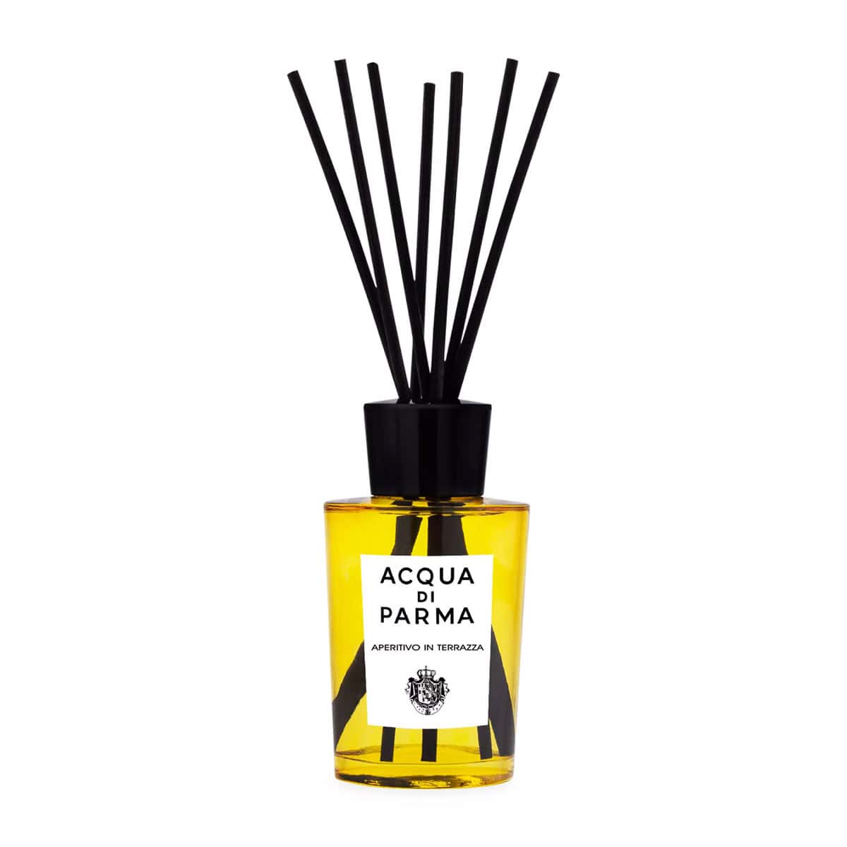 Acqua di Parma Aperitivo In Terrazza 6 OZ diffuser in an elegant glass bottle on a sunny terrace.