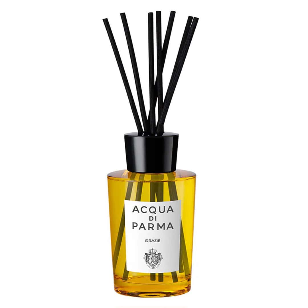 Minimalist amber glass Grazie room diffuser 6 OZ on a clean surface