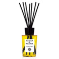 Acqua di Parma La Casa Sul Lago room diffuser in a vibrant yellow glass bottle with black accents.