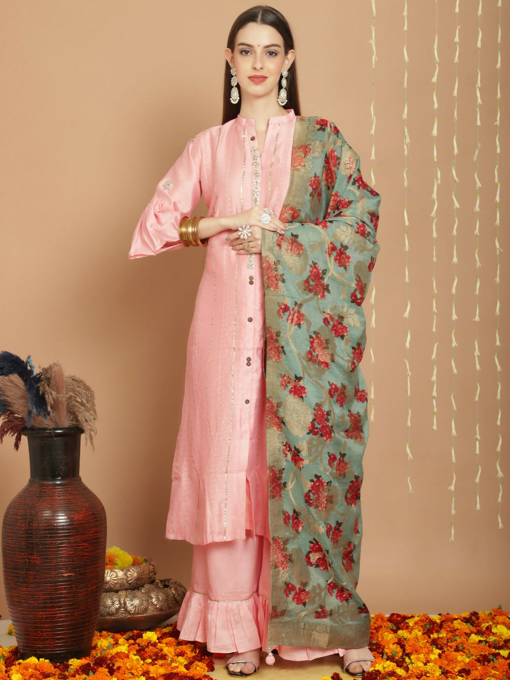 Peach Chanderi silk A-line kurta with Jardoshi embroidery and Art Silk palazzo pants.