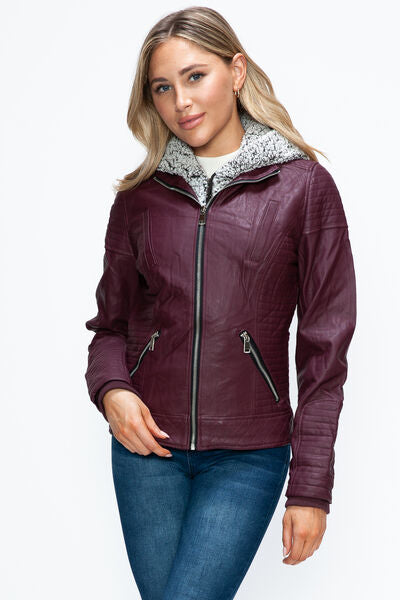 Women's dual-zipper leather jacket in burgundy and grey with a fuzzy hood