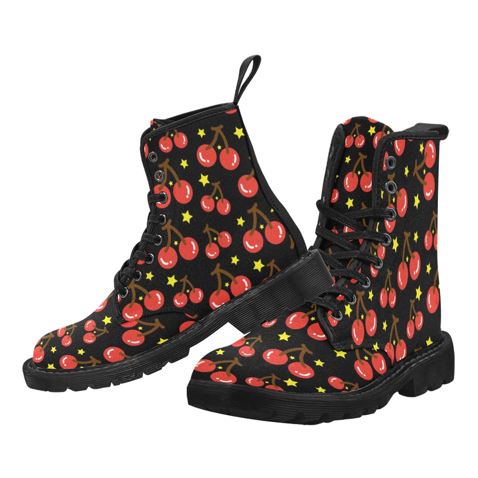 Pair of women's black canvas lace-up combat boots with an all-over red cherry and yellow star pattern, against a white background.