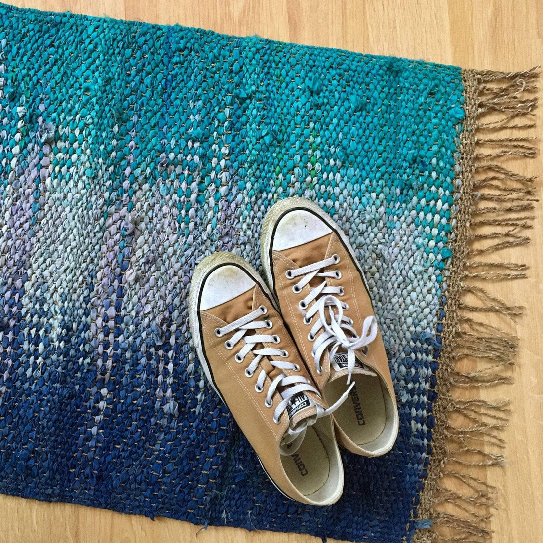 Adriatic Pools Throw Rug weaving kit laid out on a table with weaving tools