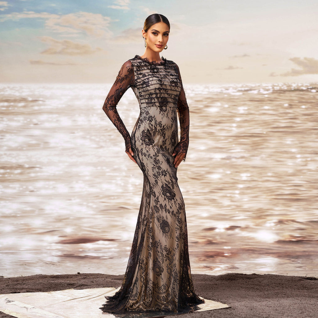 Black long-sleeve sheath fishtail evening dress with sequin details and high-waist cut.