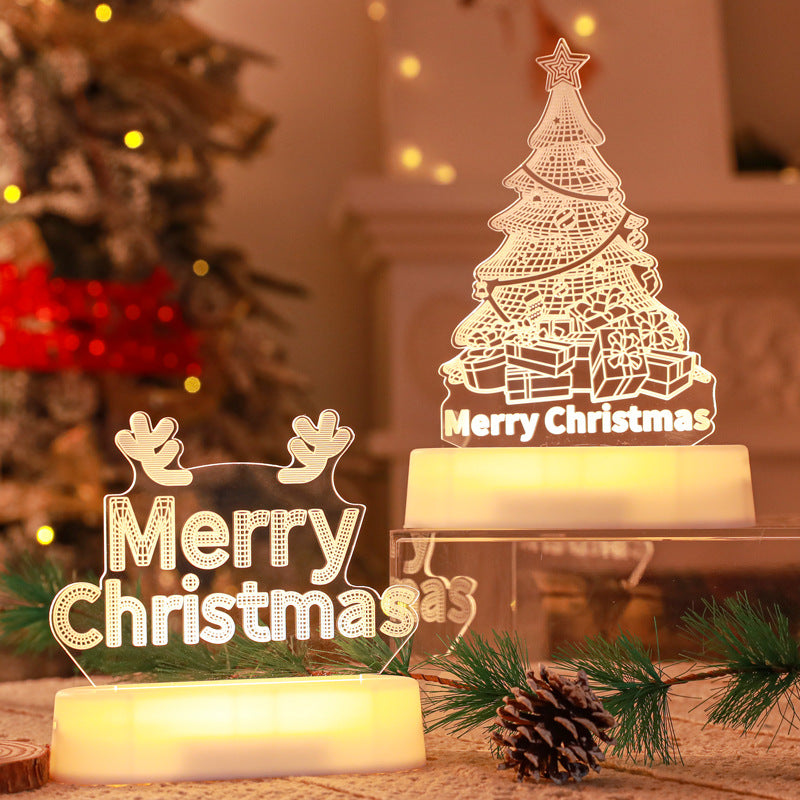 Decorative 3D acrylic LED lamp with festive holiday glow on a wooden bedside table.