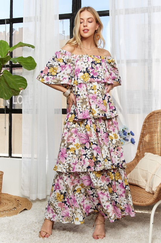 Romantic layered floral maxi dress with off-shoulder design for an elegant summer look