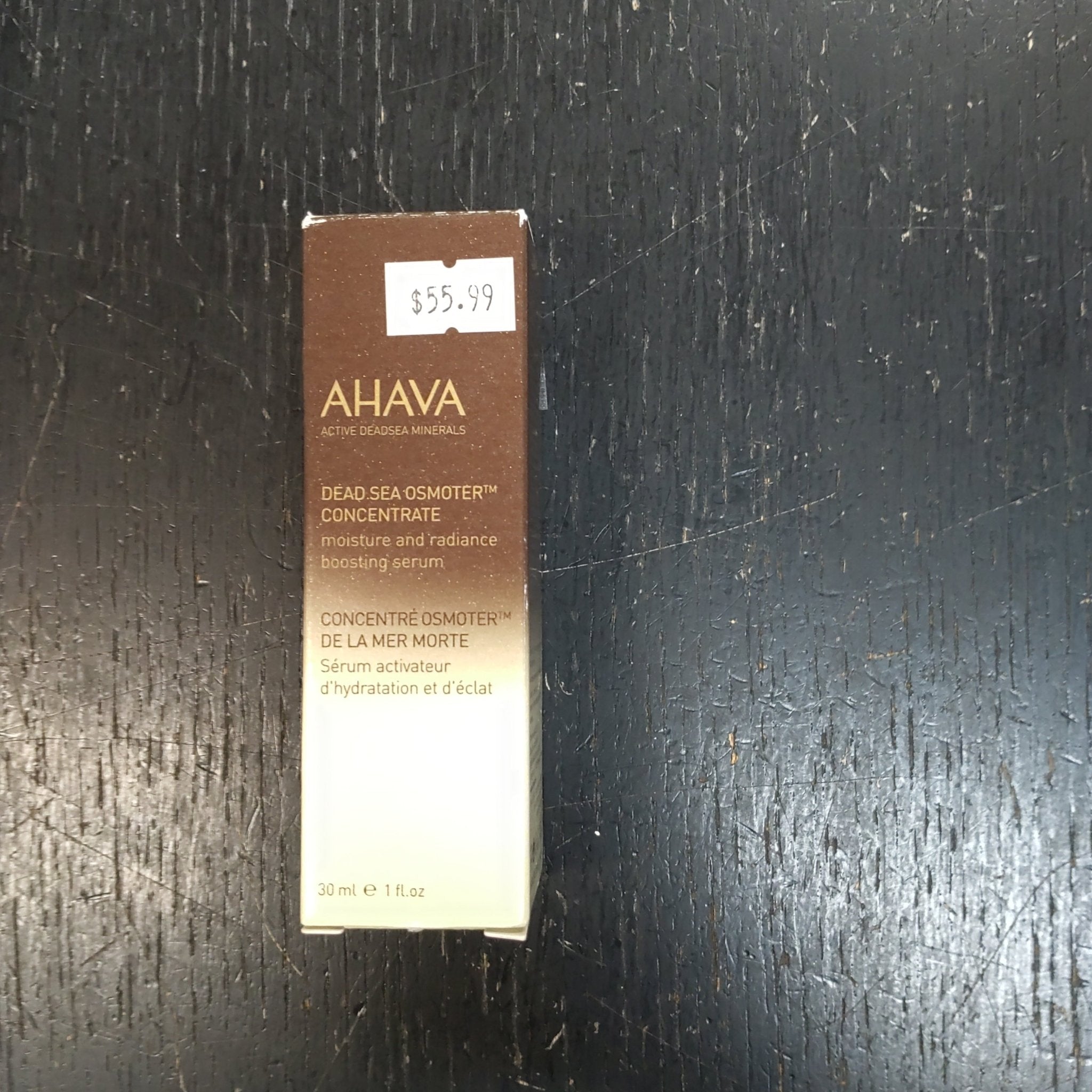 Ahava Dead Sea Osmoter Concentrate serum bottle in brown and white packaging.