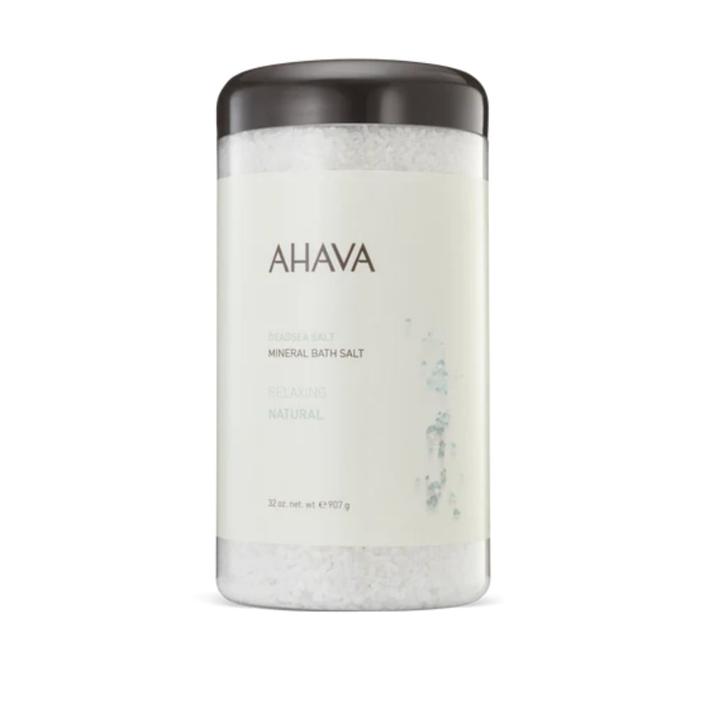A 32 oz jar of natural Dead Sea bath salts for mineral-rich body relaxation and skin hydration.