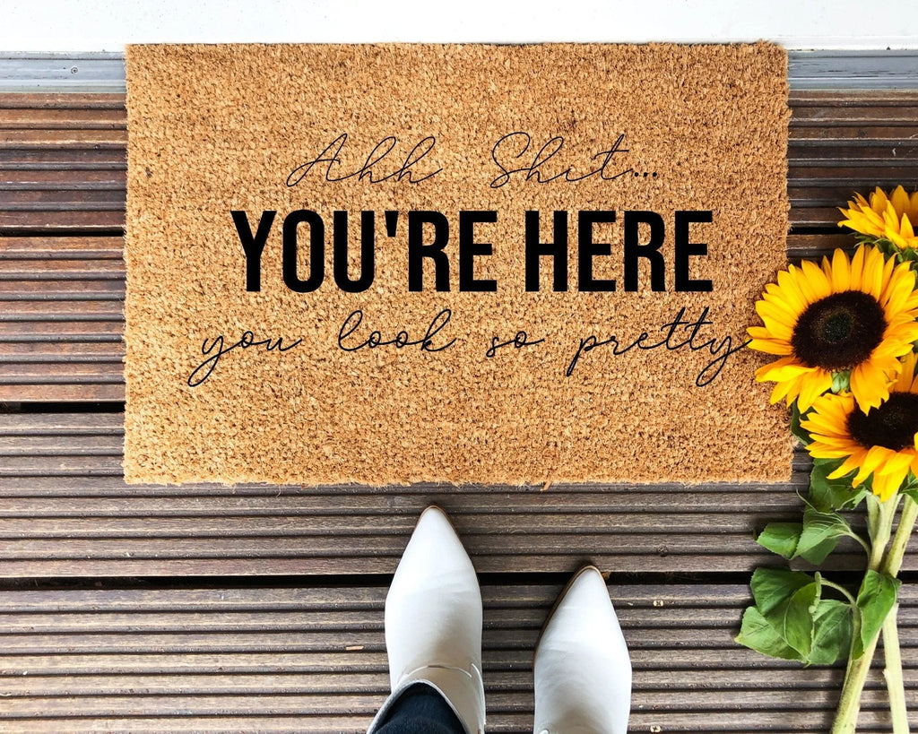 Witty brown and black Ahh Sh*t You're Here doormat