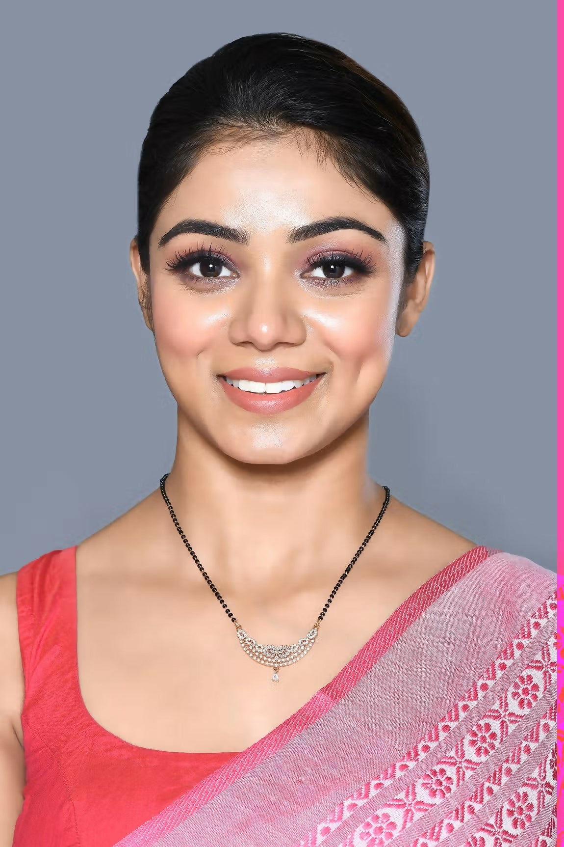 Golden white American diamond mangalsutra with matching chain on a neutral background