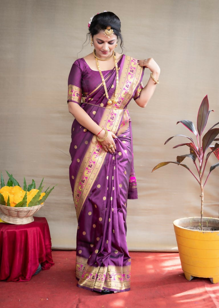 Wine colored Paithani Silk saree with metallic Zari woven patterns and matching blouse