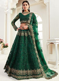 Green net lehenga choli with heavy embroidery work for wedding