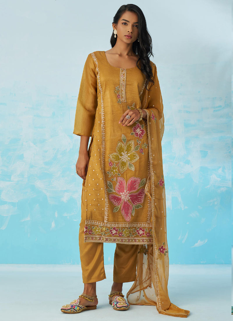 Mustard Organza party wear suit with intricate gold embroidery and Gota Patti detailing