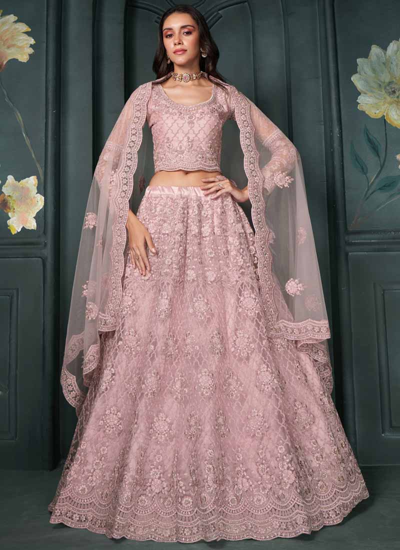 Designer dusty pink bridal lehenga in net fabric with embroidery
