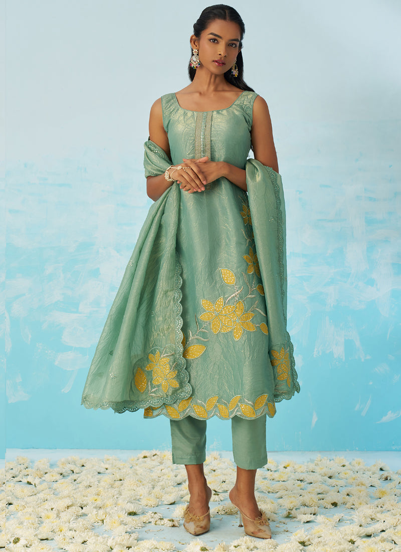 Light Green silk A-line salwar suit with delicate embroidery detail.