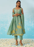 Light Green silk A-line salwar suit with delicate embroidery detail.
