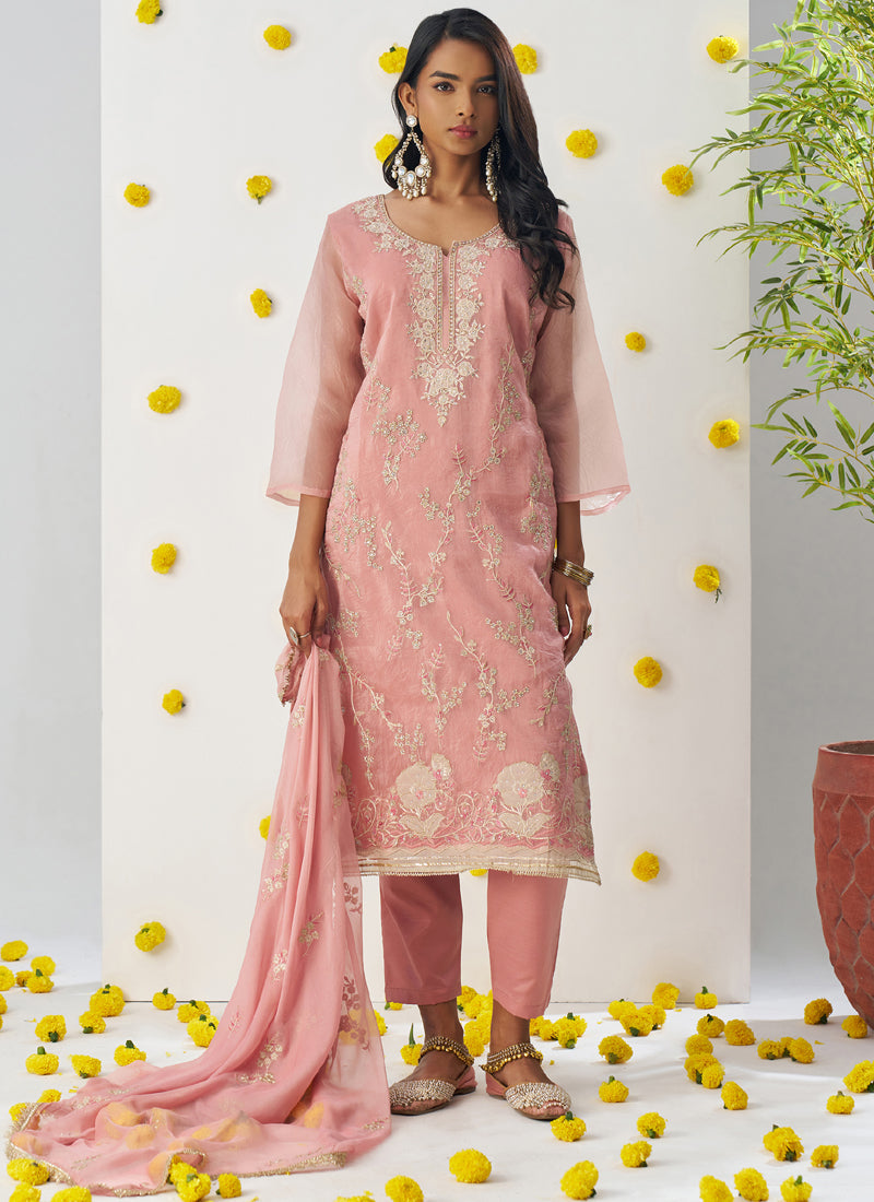 Light peach A-line organza salwar suit with delicate embroidery
