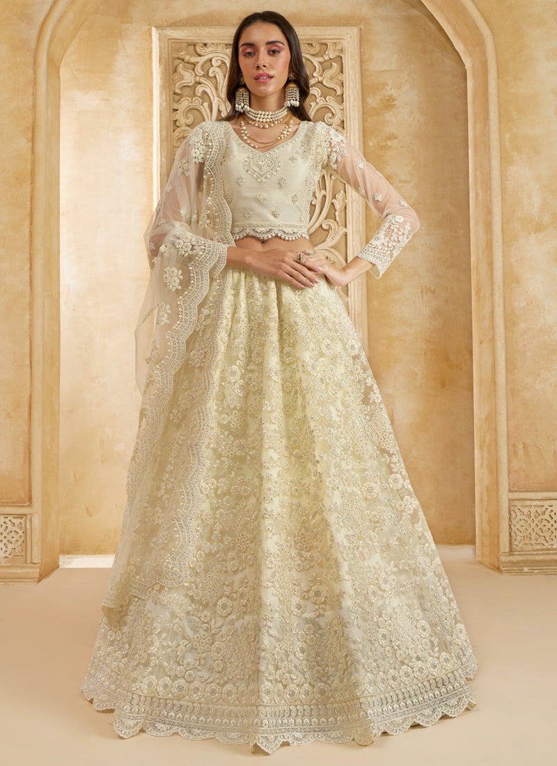 Off-white net wedding lehenga with intricate thread work embroidery and matching dupatta
