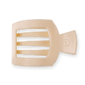 Large square hair clip in almond beige finish on a neutral background
