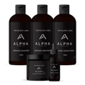 The Executive Alpha Set containing bottles of organic shampoo, conditioner, body wash, hair pomade, and beard oil in black packaging.