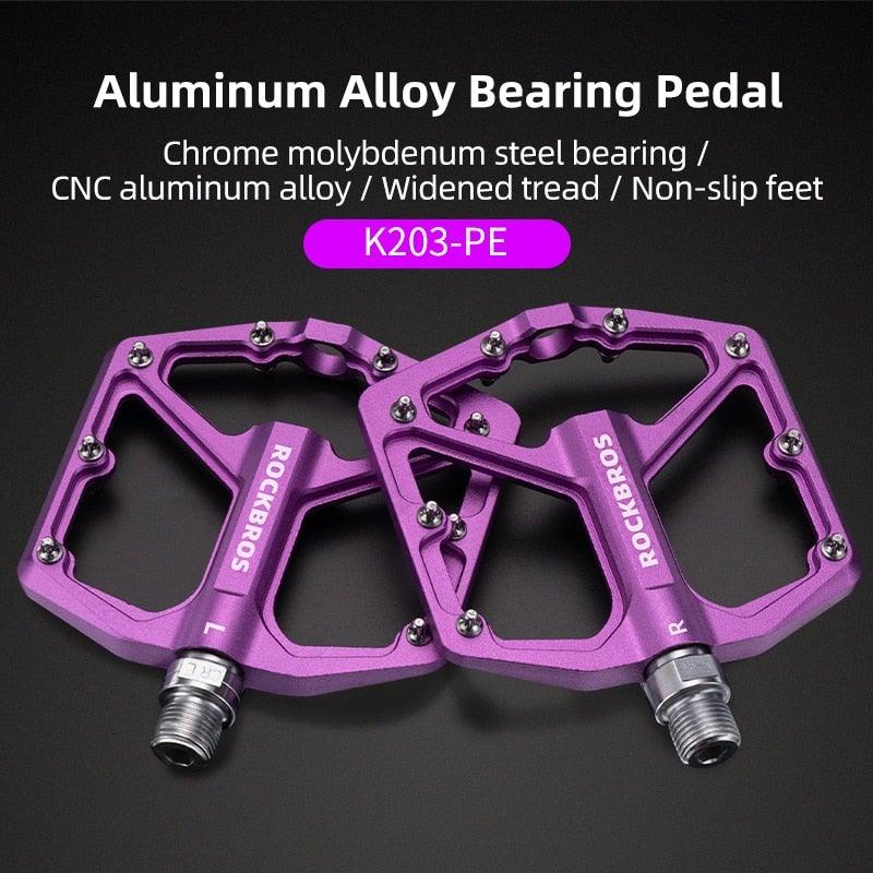 Minimalist black aluminum alloy platform bike pedals with anti-slip design