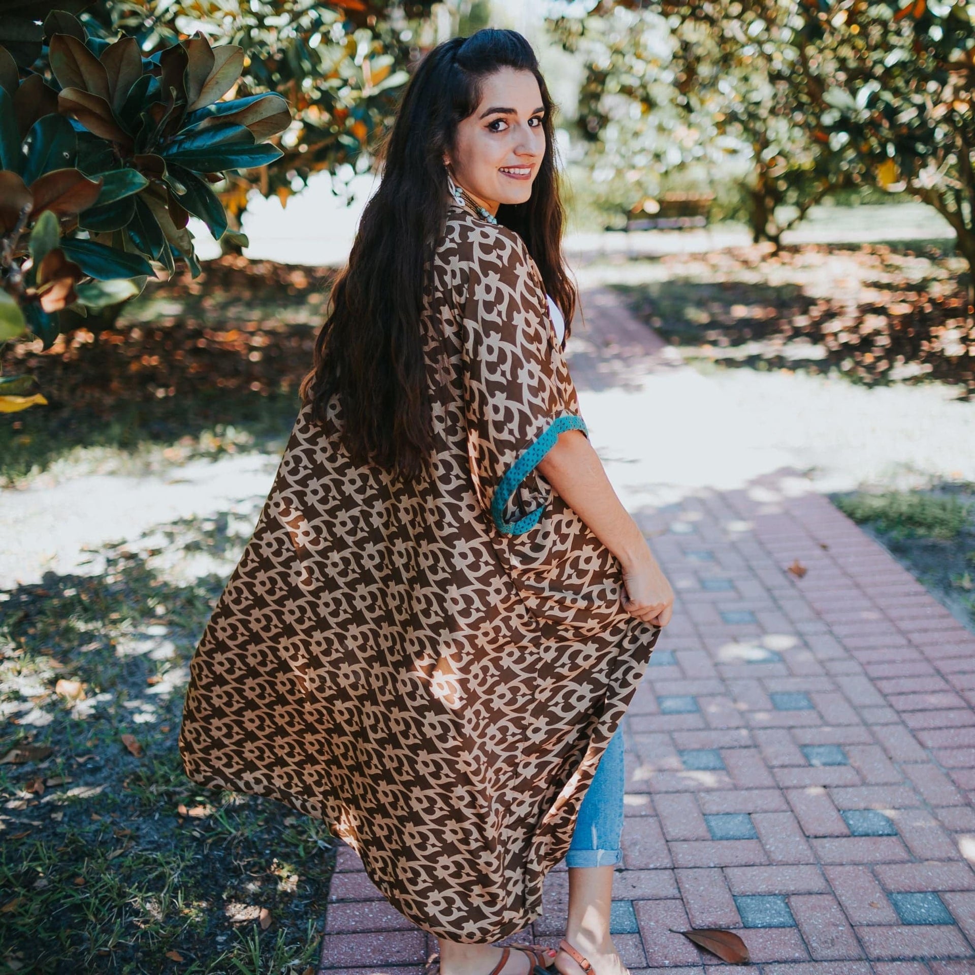 Amara Long Sari Duster in a lightweight, flowing silhouette worn as a stylish layering piece.