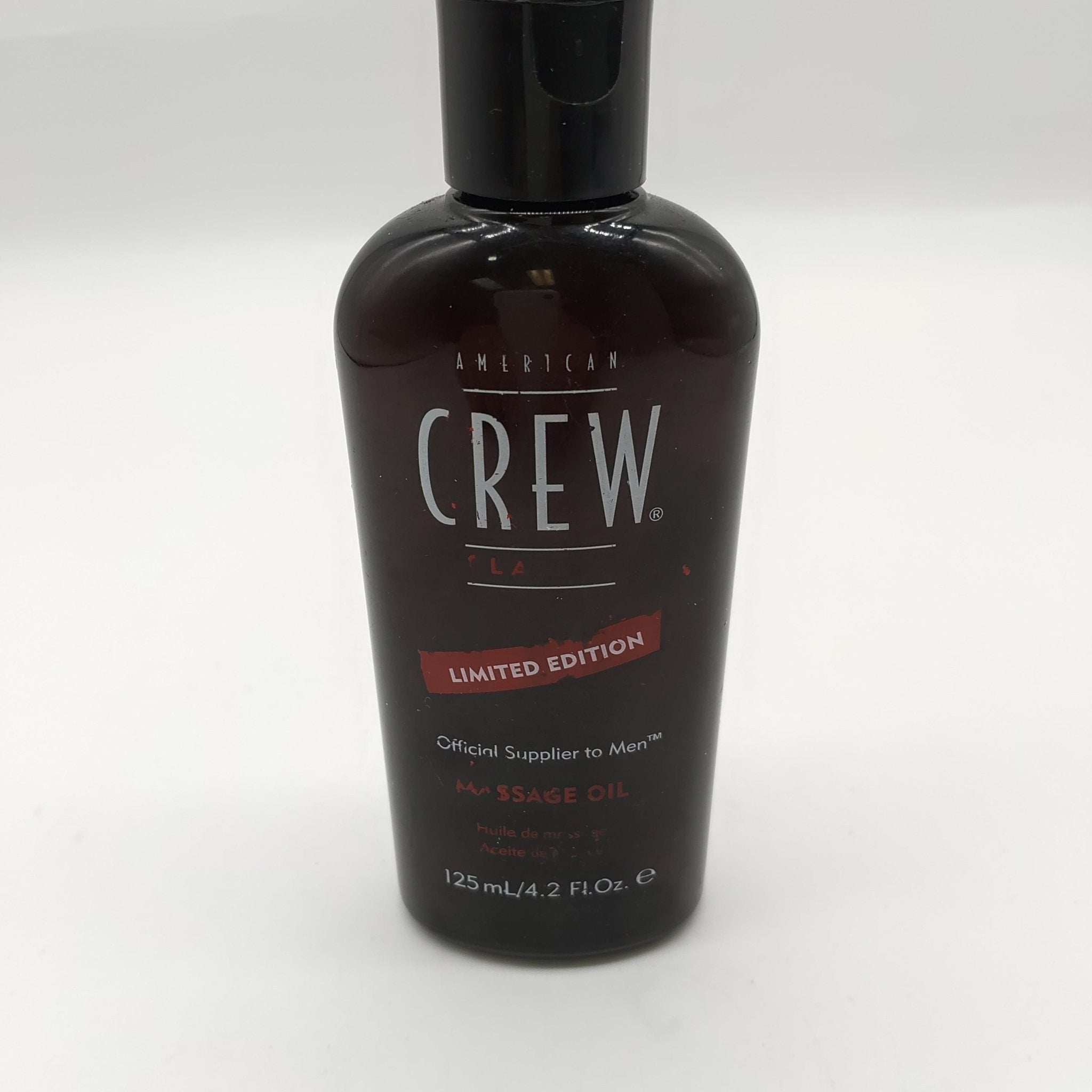 Bottle of American Crew Limited Edition Massage Oil 4.2 oz for body relaxation